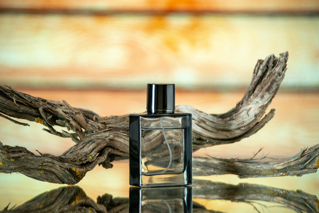 Perfume bottle set against a wooden backdrop